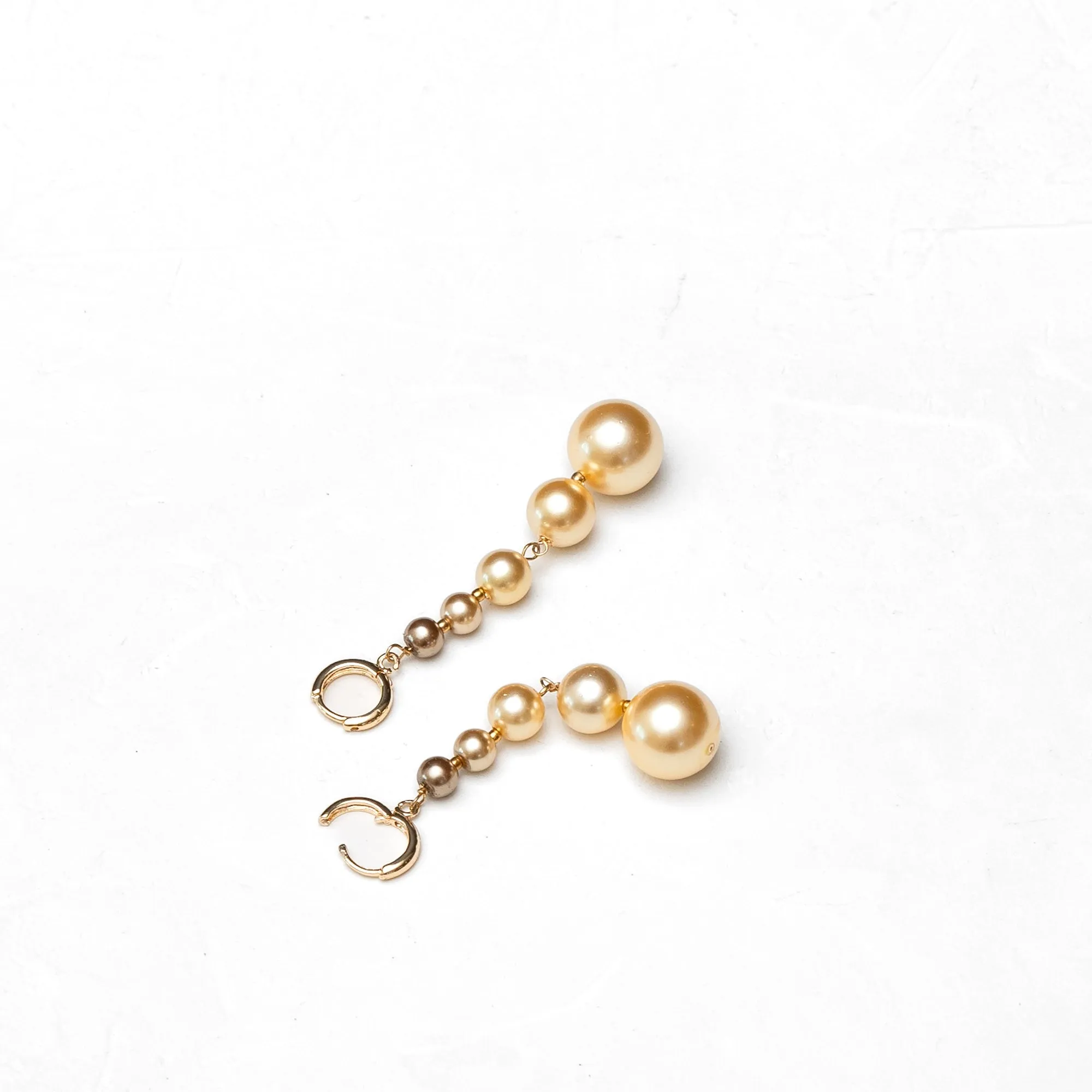 Graded South Sea Huggie Earrings