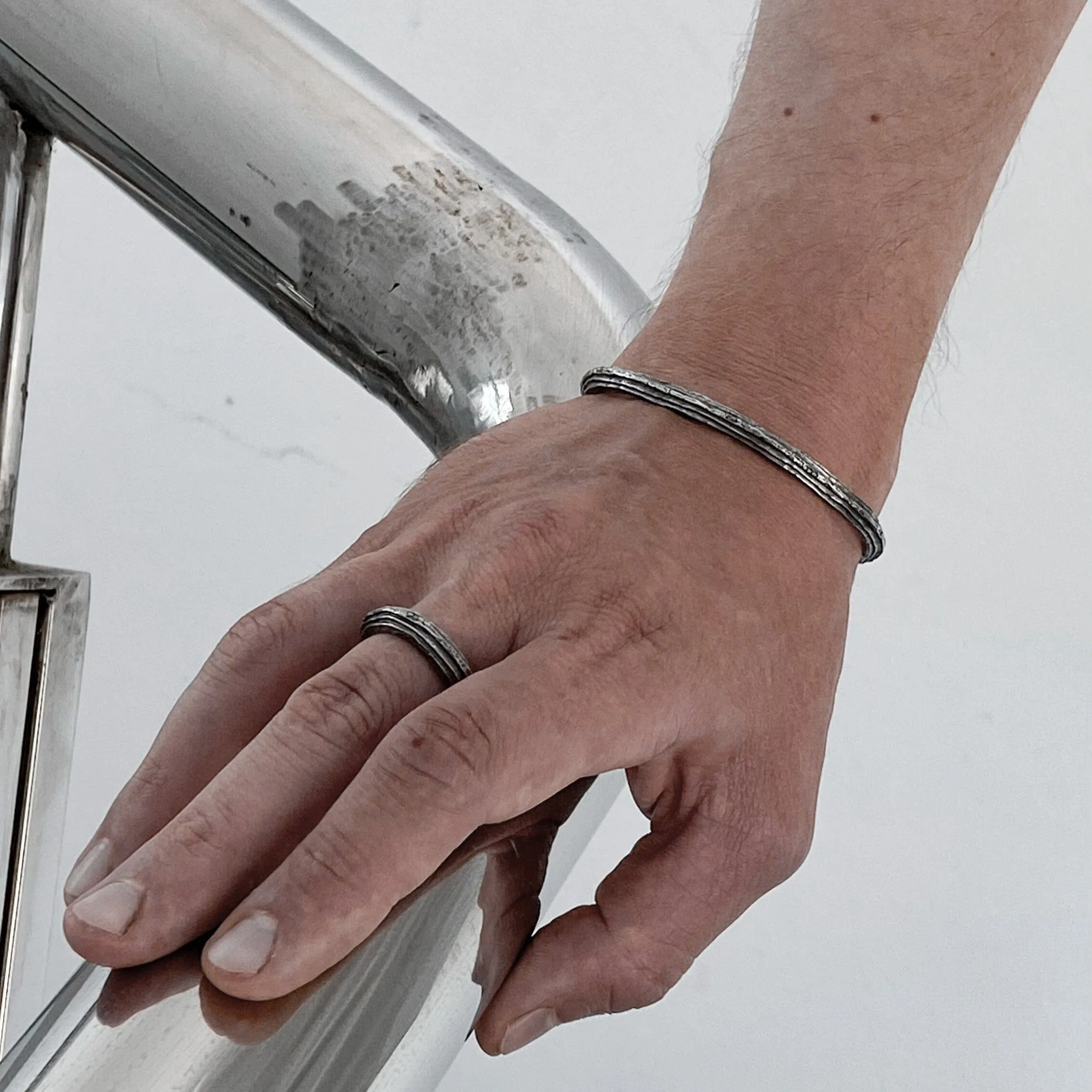 Orbit bangle- thin silver cuff bracelet with unusual hancrafted texture