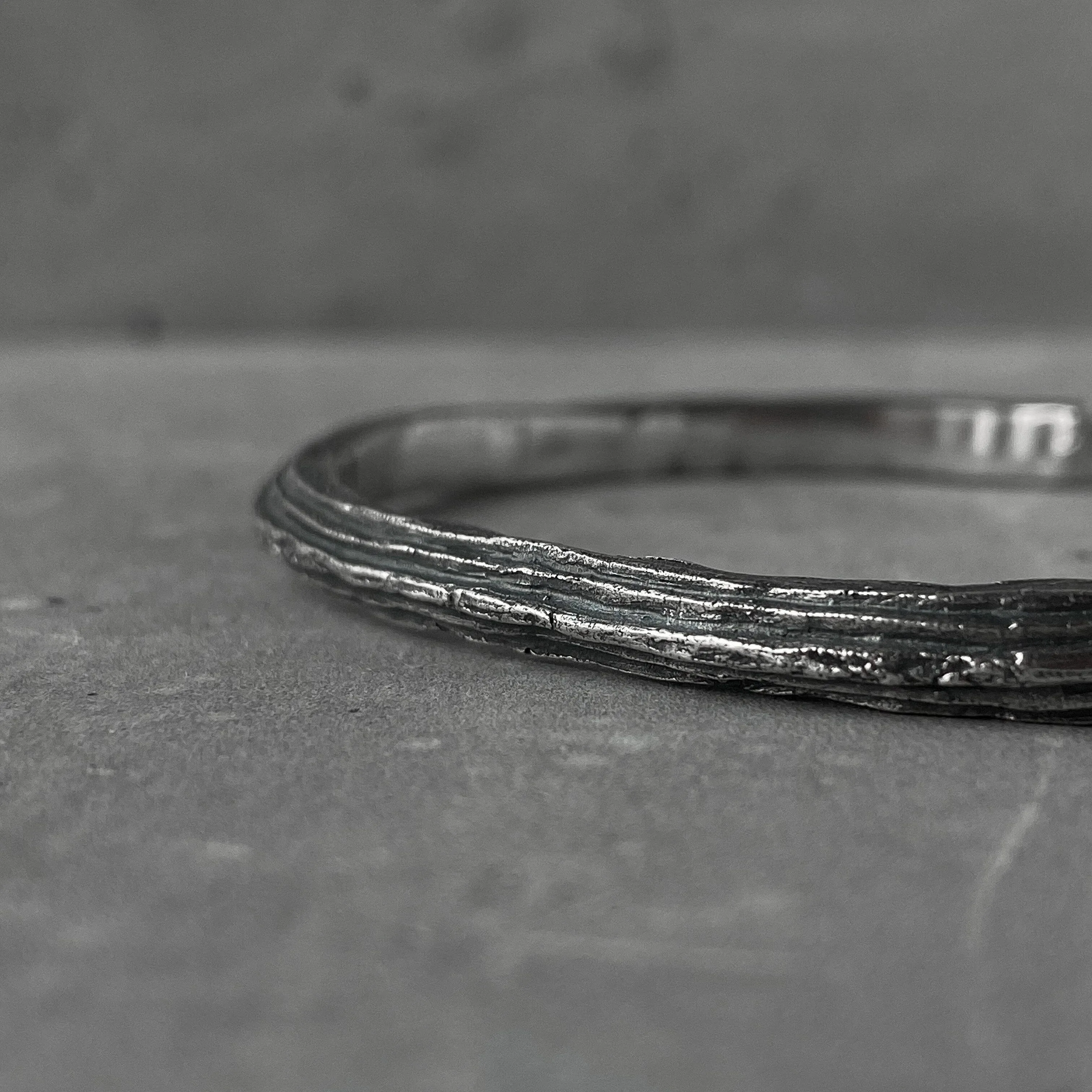 Orbit bangle- thin silver cuff bracelet with unusual hancrafted texture