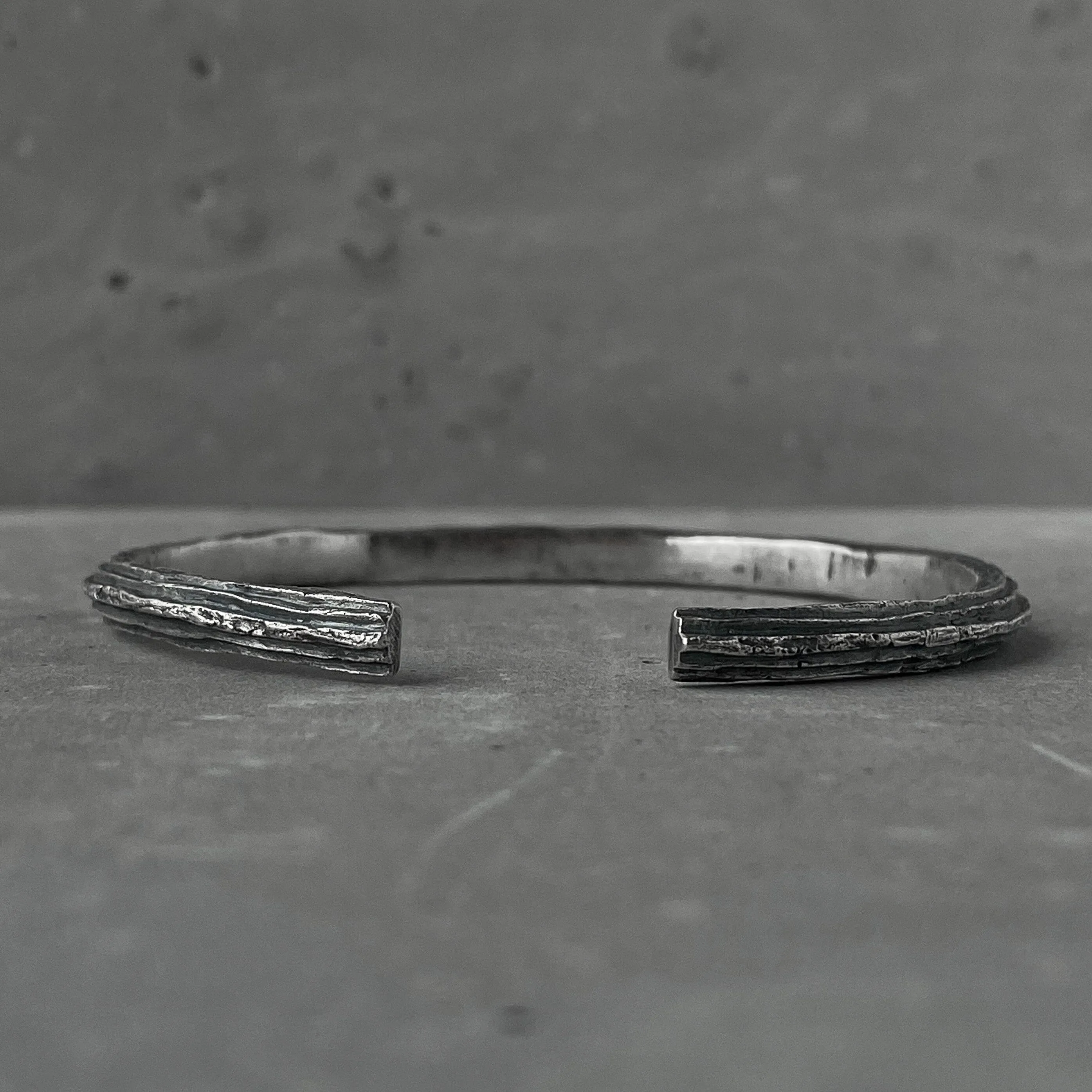 Orbit bangle- thin silver cuff bracelet with unusual hancrafted texture