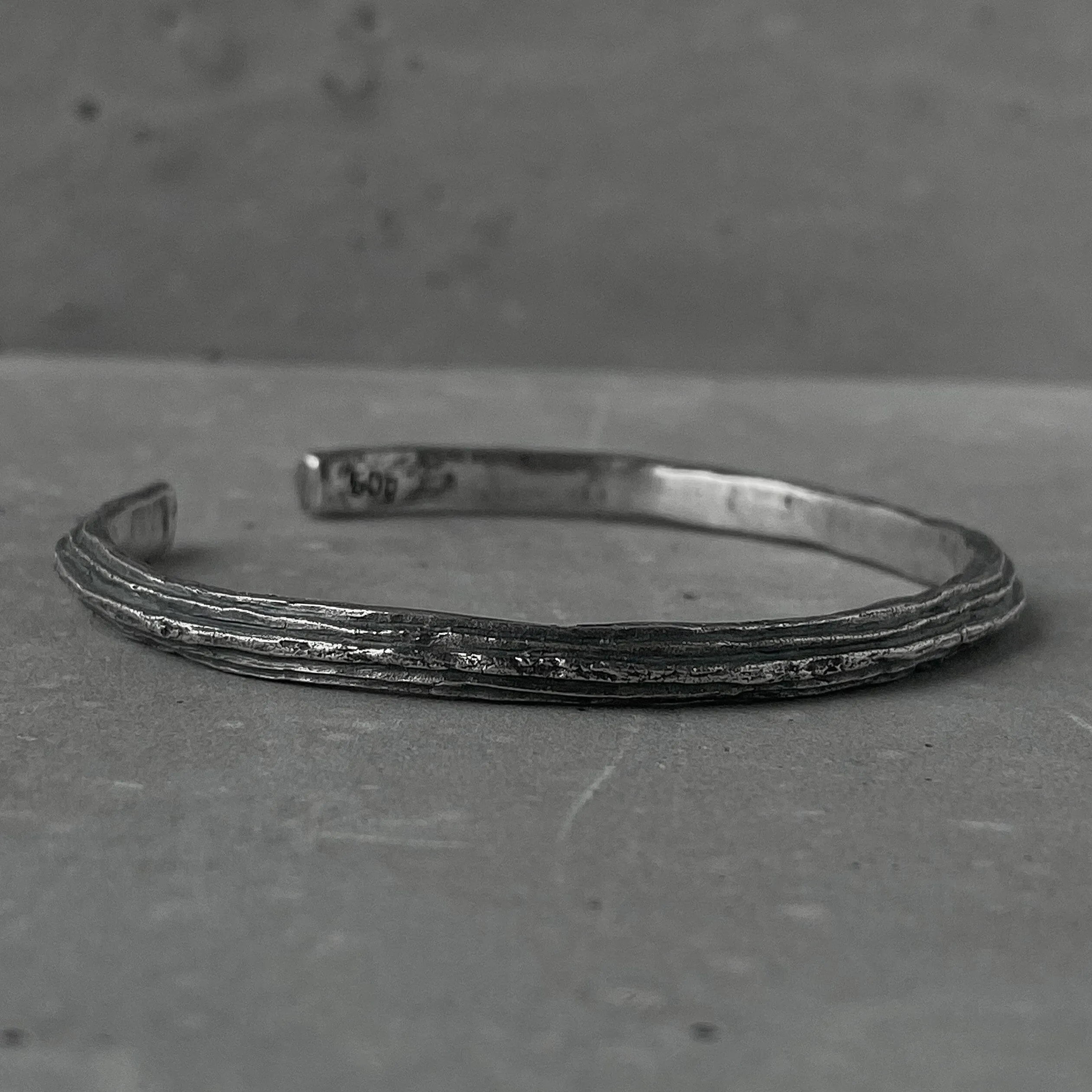 Orbit bangle- thin silver cuff bracelet with unusual hancrafted texture