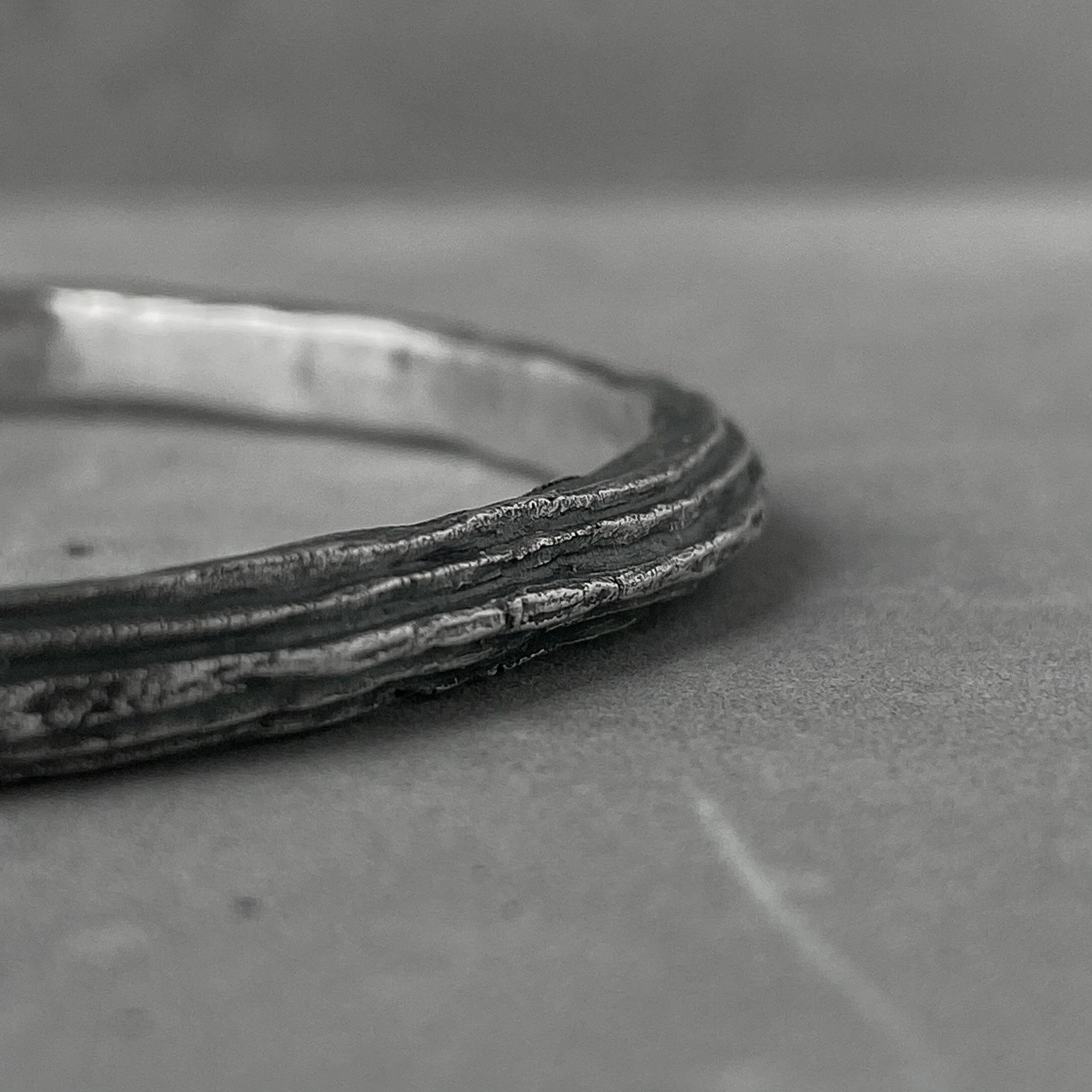 Orbit bangle- thin silver cuff bracelet with unusual hancrafted texture